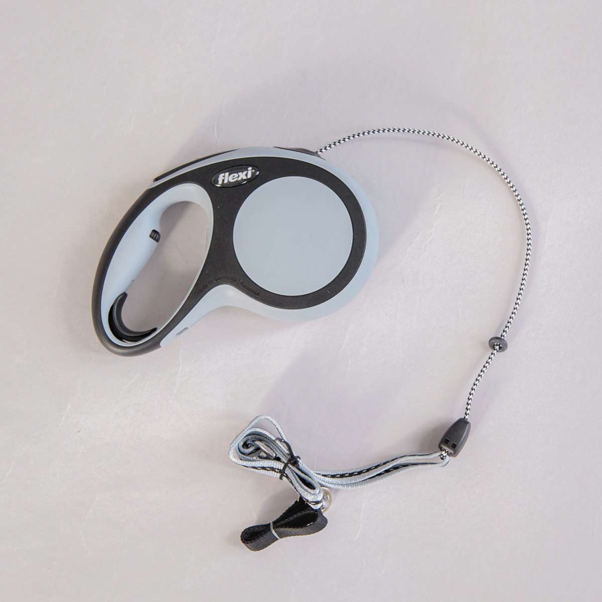 Рулетка для собак на тросе Flexi New Comfort с регулятором ручки